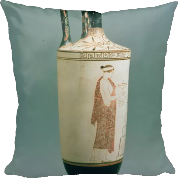 Attic white-ground lekythos decorated with a woman holding a vessel for perfume