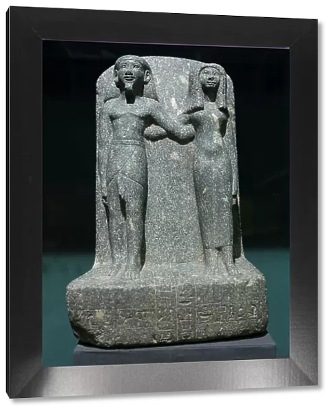 Paser and Henut, ramesside period, from Tell el Hibua (grey granite)