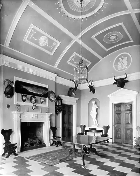 The hall at Shillinglee Hall, Sussex, from England's Lost Houses by Giles Worsley (1961-2006) published 2002 (b / w photo)
