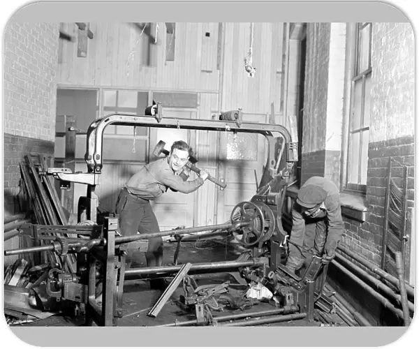 Paterson, New Jersey - Textiles. Junkies breaking up old looms, to be sold for scrap-iron