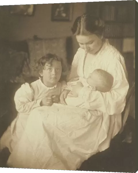 Mother dressing gown seated infant small son