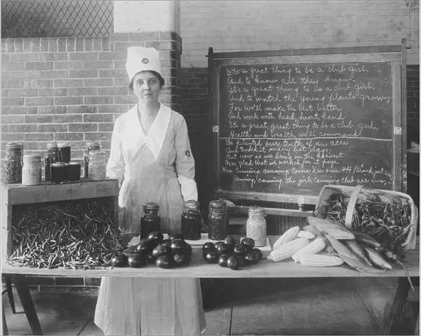 Woman wearing the official badge and uniform of the U. S. Food Administration, 1917