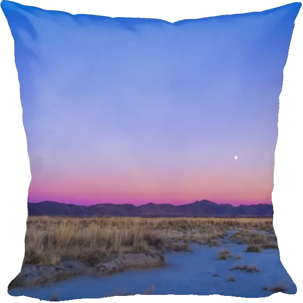 Sunset and gibbous moon above the Chiricahua Mountains in Arizona