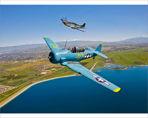 A T-6 Texan and P-51D Mustang in flight over Chino, California