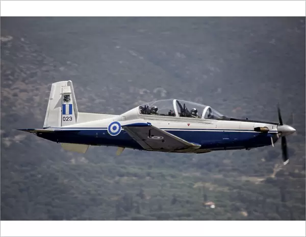 A Hellenic Air Force T-6 trainer flying over Kalamata, Greece
