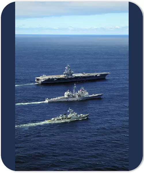 U. S. Navy ships perform tactical maneuvering exercises in the Atlantic Ocean