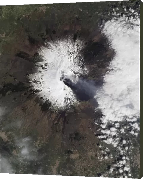Gas and ash stream from multiple craters on Sicilyas Mount Etna