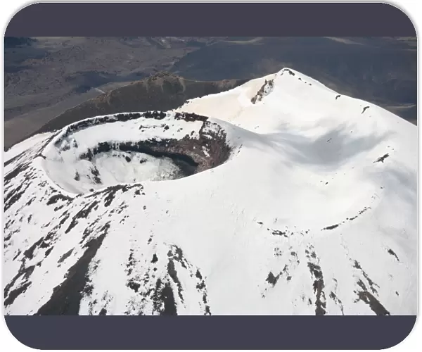 Snow-covered Ngauruhoe cone, Mount Tongariro volcano, New Zealand