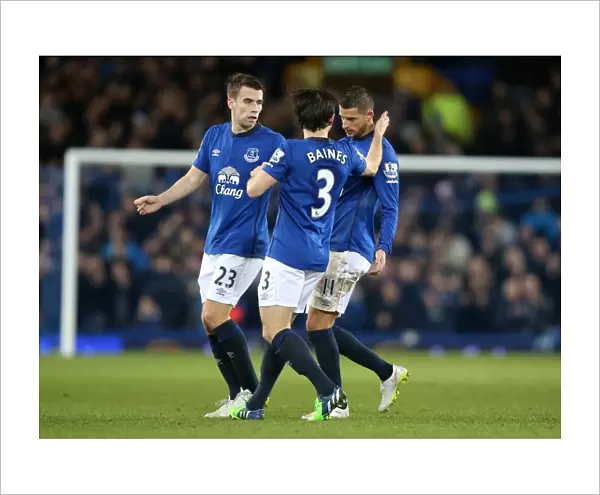 Everton's Triumph: Mirallas, Baines, and Coleman Celebrate Second Goal vs. Queens Park Rangers