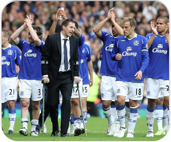 Everton's Phil Jagielka Celebrates Victory with Team Mates at Goodison Park