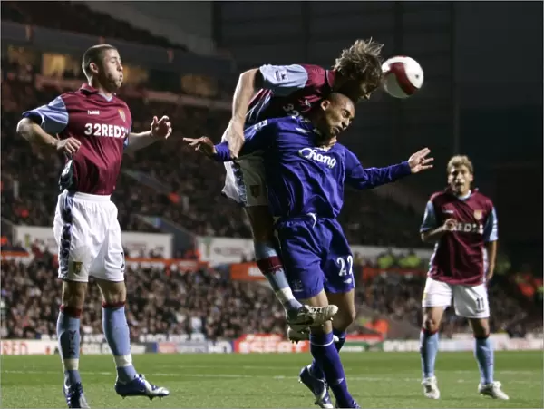 Aston Villa v Everton James Vaughan in action against Olof Mellberg