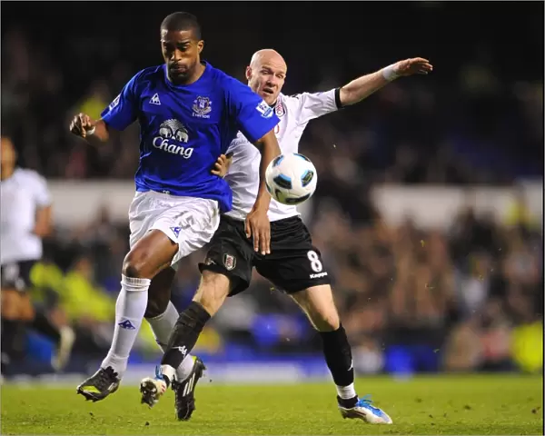 Intense Rivalry: Distin vs. Johnson - Everton vs. Fulham, Premier League Showdown (19 March 2011, Goodison Park)