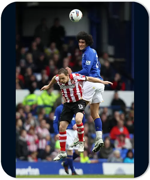 Aerial Clash: Fellaini vs. Vaughan at Goodison Park - Everton vs. Sunderland, Premier League (09 April 2012)