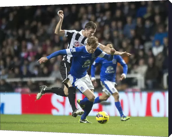 Battle for the Ball: Jelavic vs. Williamson - Everton's Victory at St. James Park (Everton 2-1 Newcastle United)