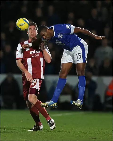 Everton's Sylvain Distin Clears the Ball in FA Cup Third Round Match against Cheltenham Town (January 7, 2013) - Everton 5-1 Cheltenham Town