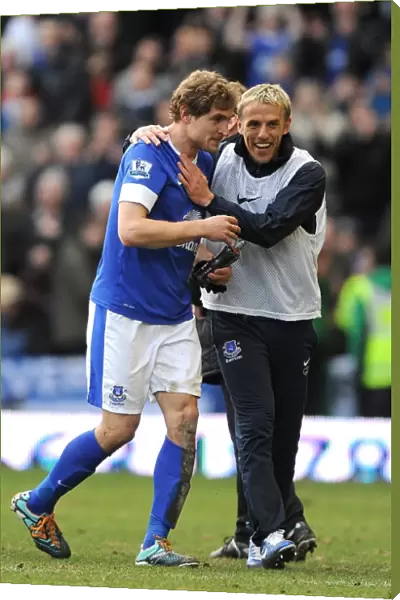 Everton's Jelavic and Neville: Celebrating Victory Over Manchester City (2-0, Goodison Park, 16-03-2013)