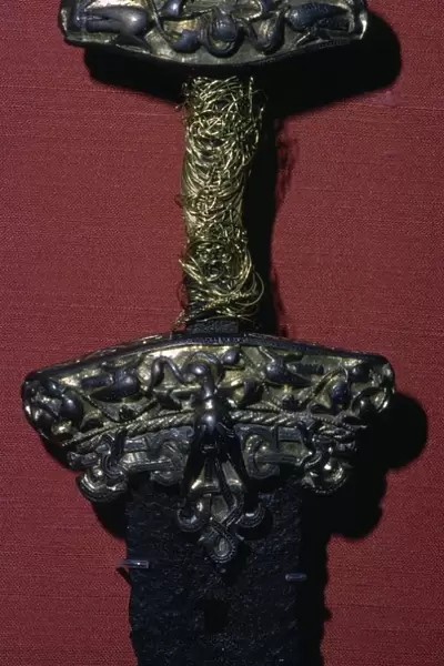 Viking sword with silver and gold hilt, 8th-11th century