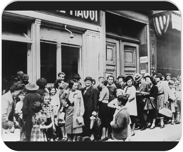 People queuing outside a dairy shop, German-occupied Paris, 26 July 1940