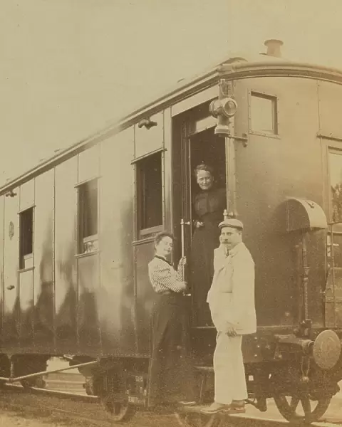 Eleanor Pray and Sarah Smith posed with their friend Mr Hunt at a Trans-Siberian railroad... 1899. Creator: Frederick S. Pray
