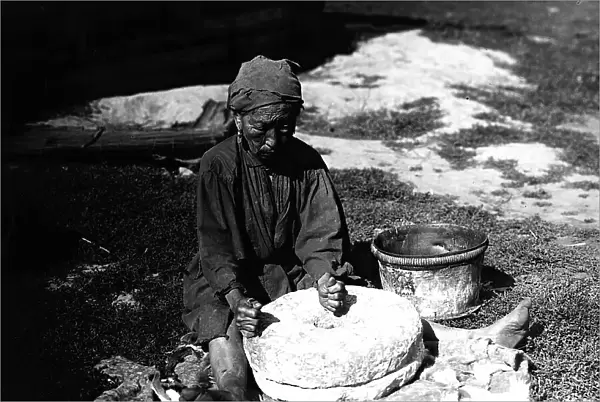 Working with a flour millstone, 1890. Creator: Unknown