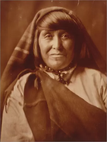 An Acoma woman, head-and-shoulders portrait, facing front, c1904. Creator: Edward Sheriff Curtis
