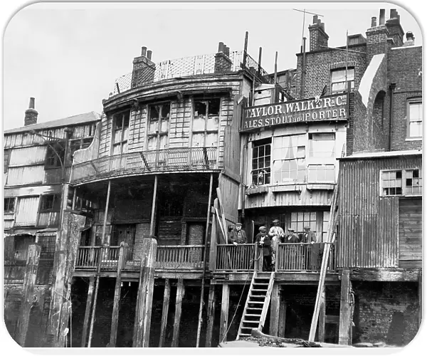 The old barge office and the Grapes Public House at Limehouse in London in 1924