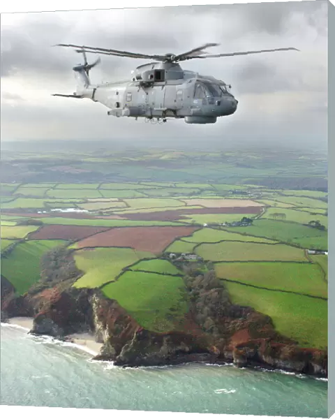 A Merlin HM Mk1 helicopter from 829 Naval Air Squadron, based at RNAS Culdrose, flying