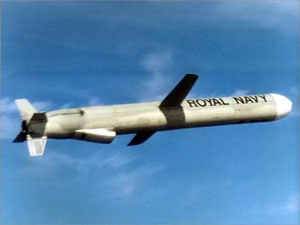 Tomahawk Land Attack Missile ( Cruise Missile) (TLAM) flying through the air. 12  /  04  /  2000