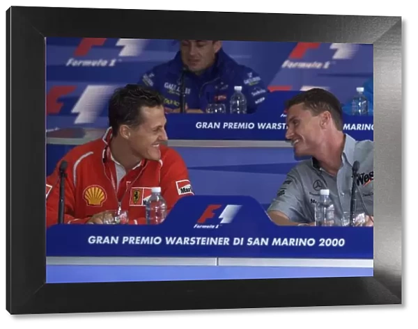 Michael Schumacher jokes with David Coulthard