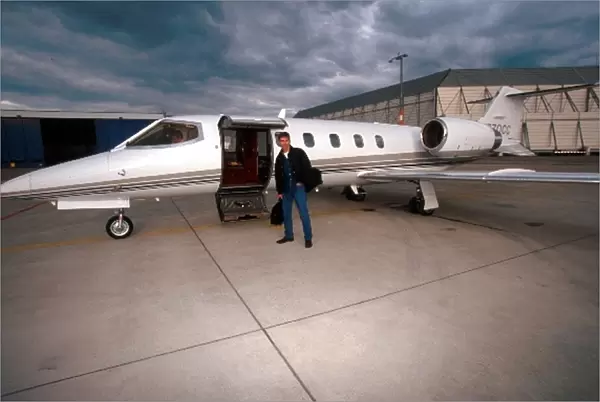 Formula One World Championship: Damon Hill with the Lear Jet that he uses to fly to the races