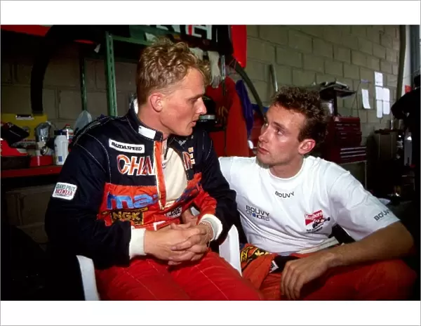Le Mans 24 Hours: L-R: Johnny Herbert talks with Mazda teammate Bertrand Gachot