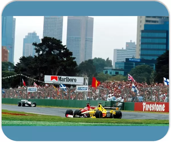 Formula One World Championship: Rubens Barrichello Ferrari F1 2001 tries to pass Heinz-Harald Frentzen Jordan Honda EJ11