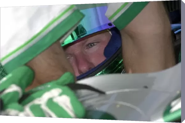 Paul Tracy gets belted in for qualifying for the Motorola 220 at Road America