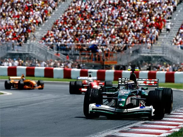 2002 Canadian Grand Prix - Priority Eddie Irvine, Jaguar Cosworth R3, leads Mika Salo