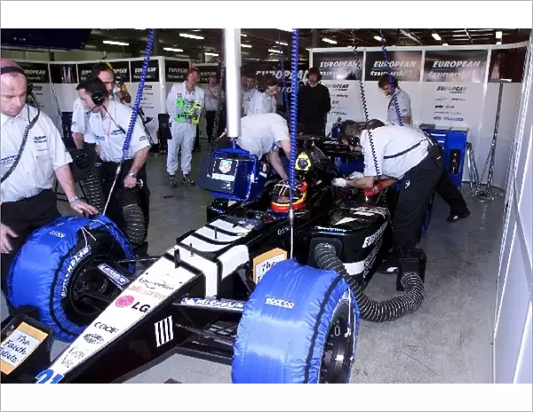 Australian Grand Prix: Fernando Alsonso European Minardi PS01 prepares for his first practice as a Grand Prix driver