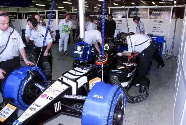 Australian Grand Prix: Fernando Alsonso European Minardi PS01 prepares for his first practice as a Grand Prix driver