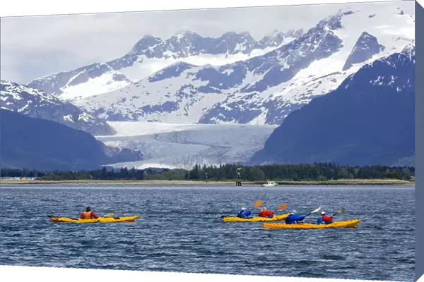 Sea Kayakers In Gastineau Channel With Mendenhall Glacier And Coast Mountains In The Background In Southeast Alaska During Summer
