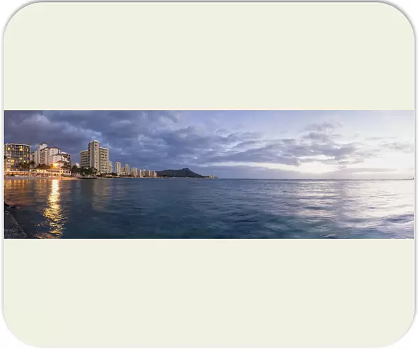 Waikiki Beach Basking In The Last Moments Of A Days Sunlight; Honolulu, Oahu, Hawaii, United States Of America