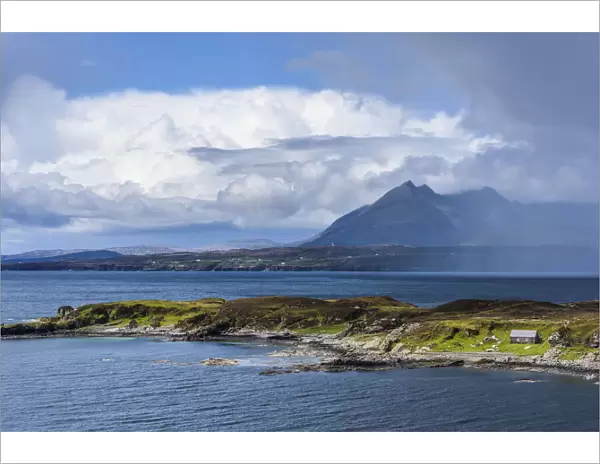 Scottish coast with dramatic cloud formations on the Isle of Skye in Scotland, United Kingdom