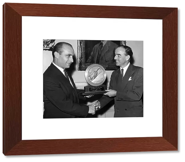 J. M Fangio wins driver of the year award from the guild of motoring writers