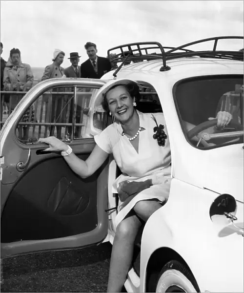 Mrs. Gordan Offord poses in a car during the Brighton beauty contest