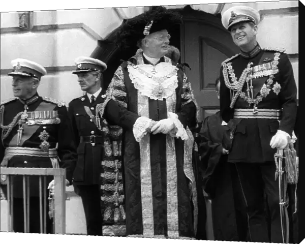 Prince Philip, Duke of Edinburgh, taking the salute with the royal marines outside