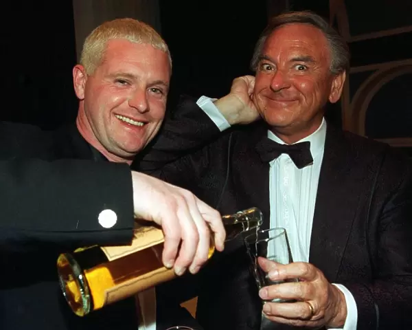Paul Gascoigne gives Bob Monkhouse pours from bottle glass whisky Ibrox last night