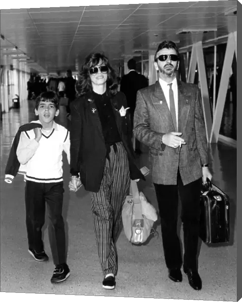 Ringo arrival. Ringo Starr arriving at Heathrow with wife Barbara Bach and her son
