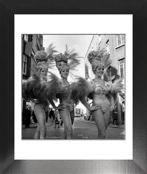 Framed Print : Black and white print of eight women in show costumes