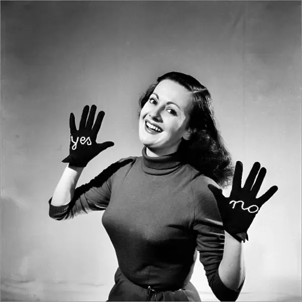 Woman modelling Yes-No Glove. December 1952 C6269-001