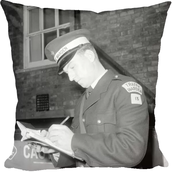Traffic warden during training writing a fine fining uniform