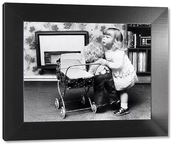 Louise Brown Test Tube Girl playing with doll and dolls pram June 1980