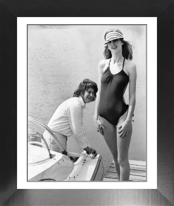 Framed Print : A 1976 Print of a Woman in a Revealing Swimsuit