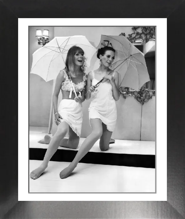 Framed Print : A woman models a luxurious Antron jersey half-slip and non-run tights